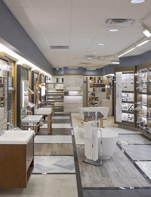 Image of a showroom with stone, tile, and bathroom fixtures