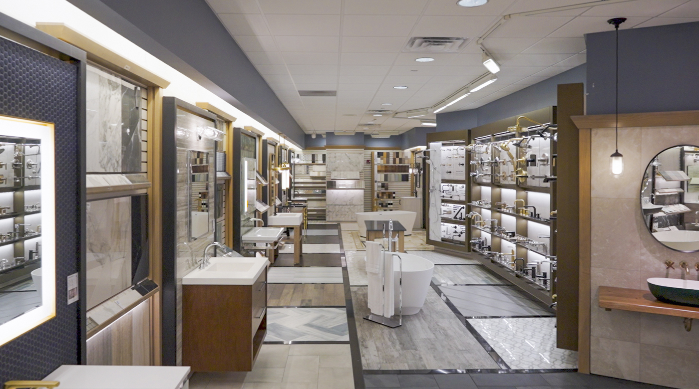 Image of a showroom with stone, tile, and bathroom fixtures
