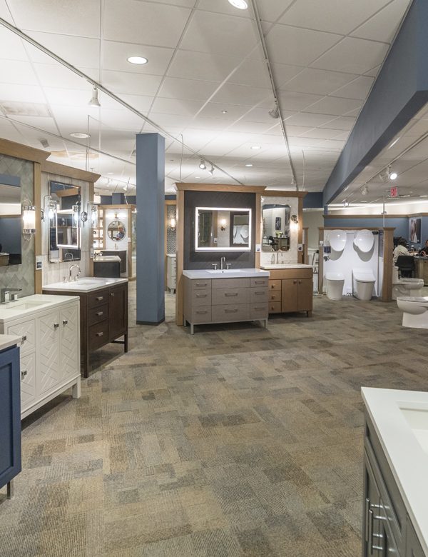 Image of a showroom with stone, tile, and bathroom fixtures