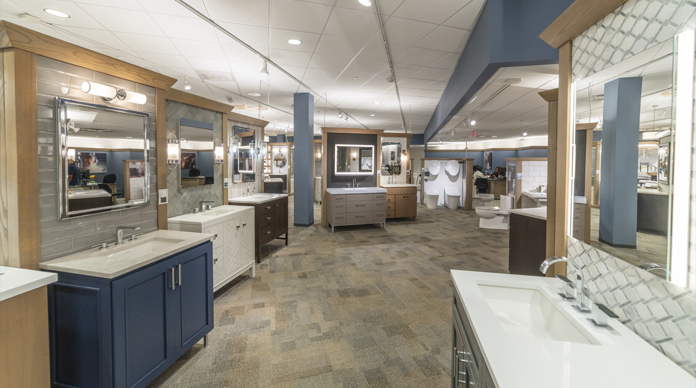 Image of a showroom with stone, tile, and bathroom fixtures
