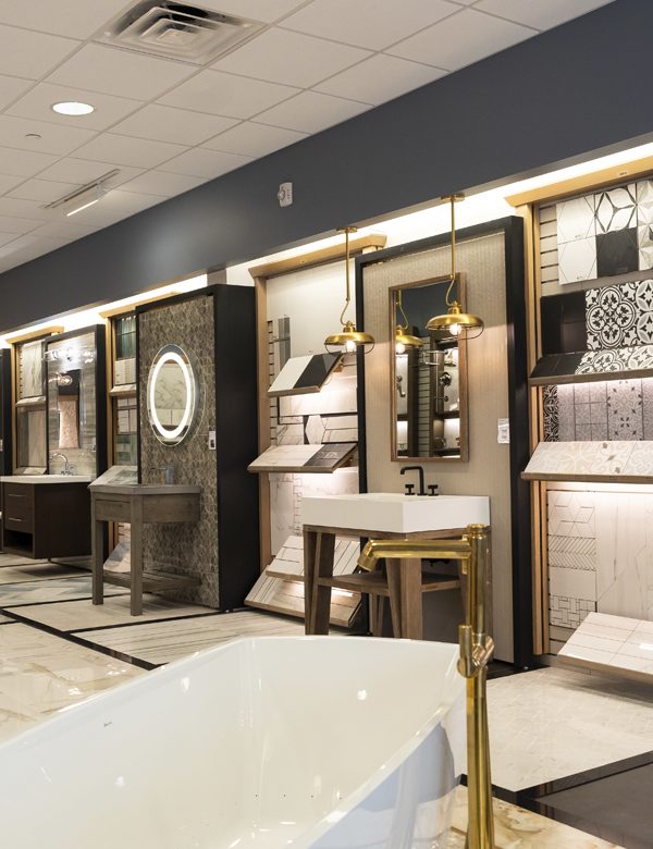 Image of a showroom with stone, tile, and bathroom fixtures