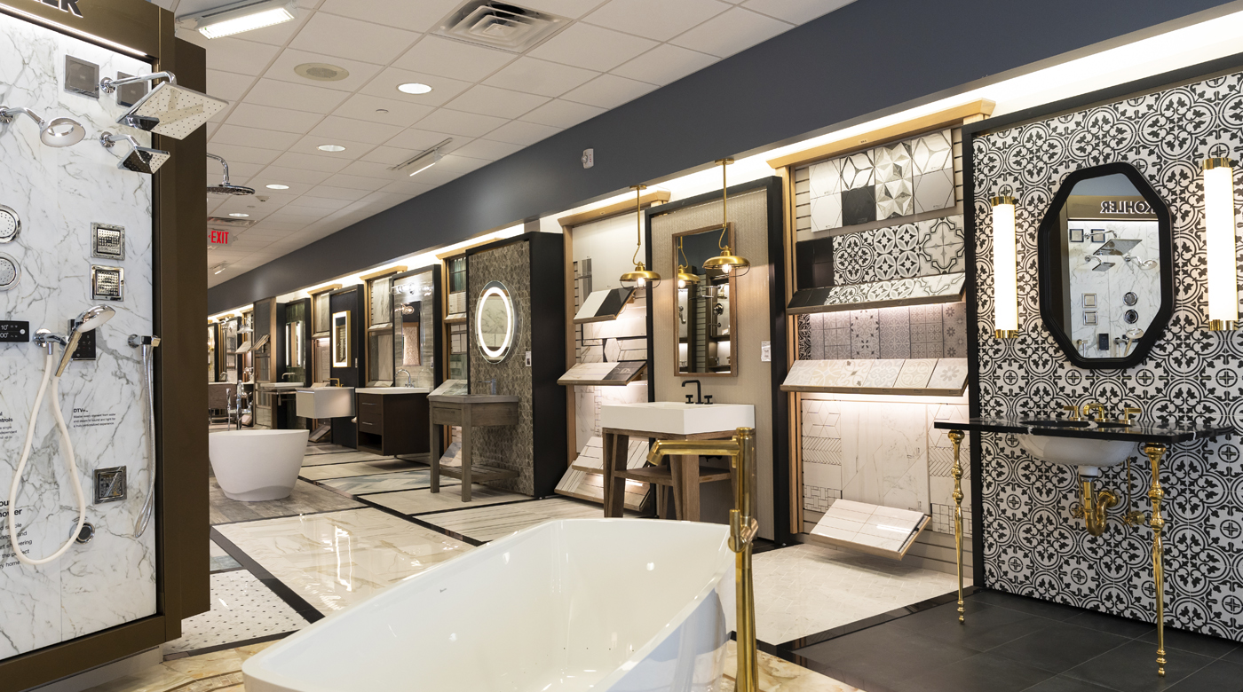 Image of a showroom with stone, tile, and bathroom fixtures